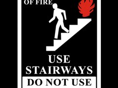 In Case of Fire Use Staircase Sign